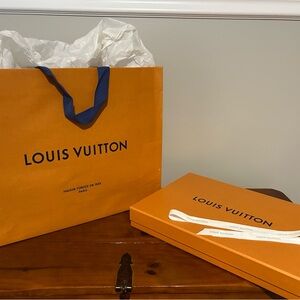 Louis Vuitton Bold Orange Bag with Blue Accents